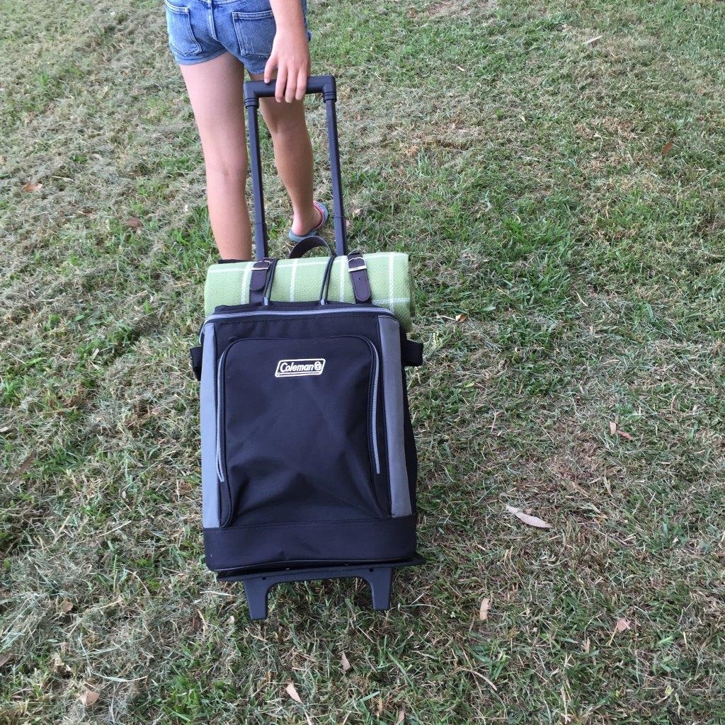 Easy to use Coleman wheeled insulated soft cooler bag with retractable  handle and additional storage